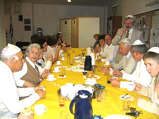 After services at the Kiddush table